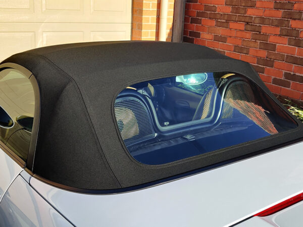 Porsche Boxster 986 soft top, produced in Haartz Twillfast RPC and comes with plastic window, side cable assembly installed, factory style seams and no binding